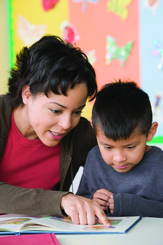 mom and son reading a book